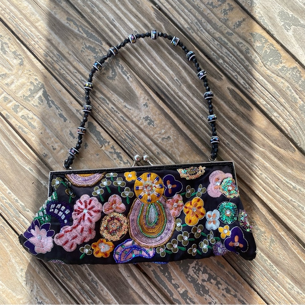 Teramasu beaded clutch purse.